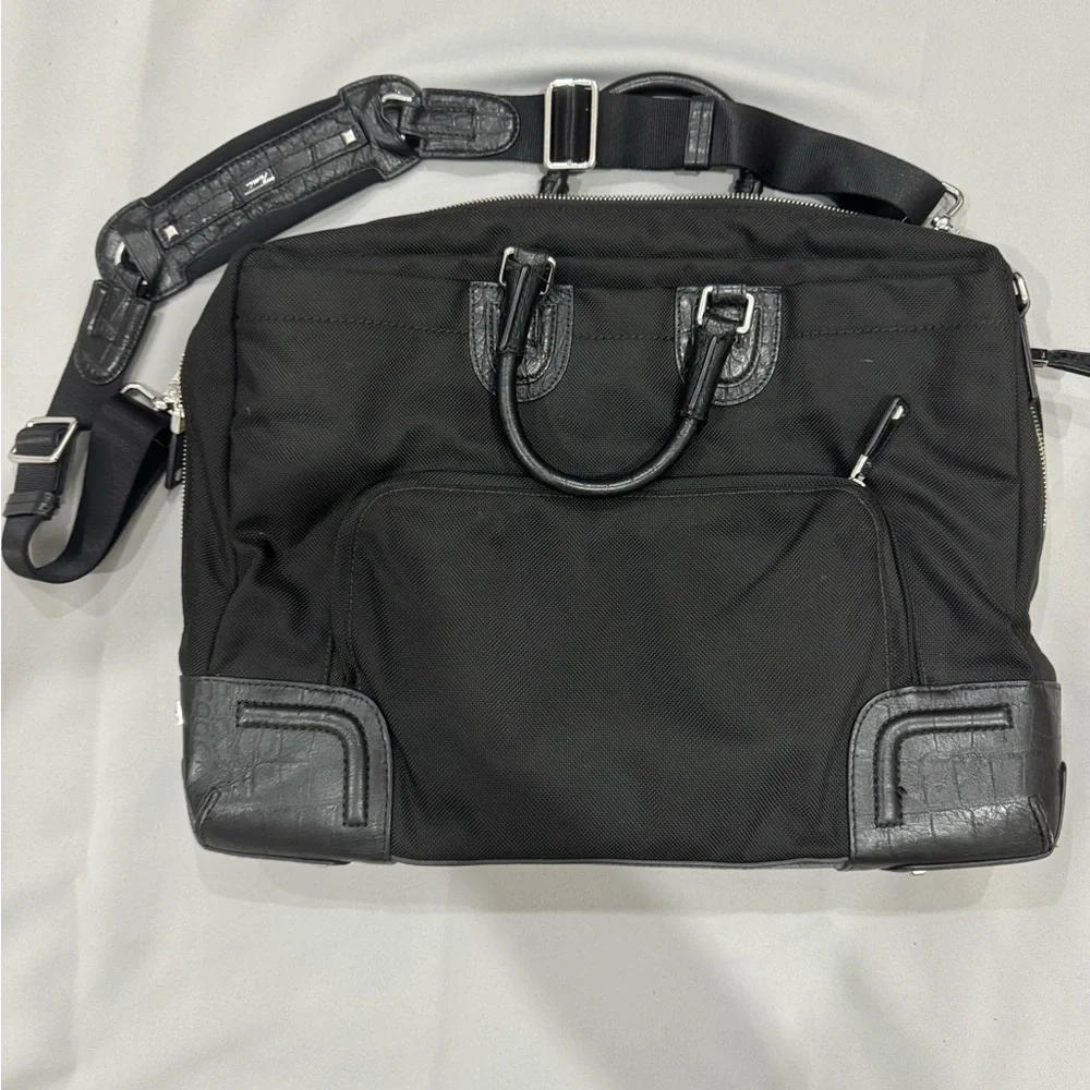 Tumi Travel Black Briefcase with Leather Finish and Metal Accents